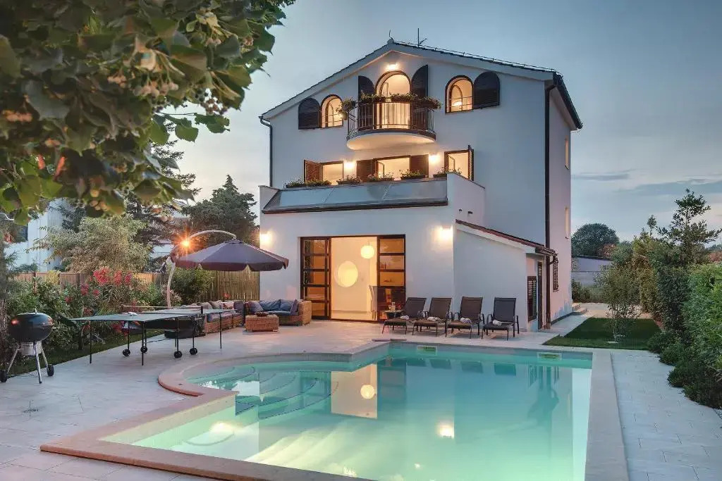 Villa Andrija Family Dream with heated pool at the sea with beautiful garden, outside cinema and kids playground