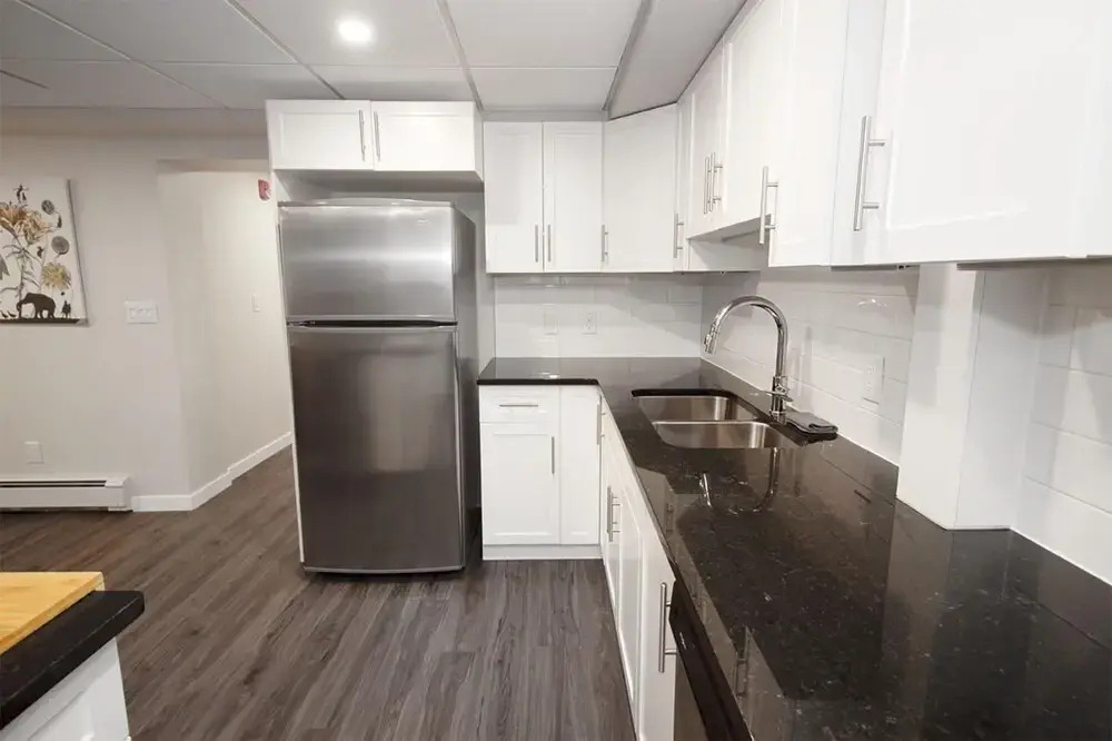 Cozy One Bedroom in a Historic Home on the Assiniboine River Lower Level Unit With Den in Wolseley Parking Included
