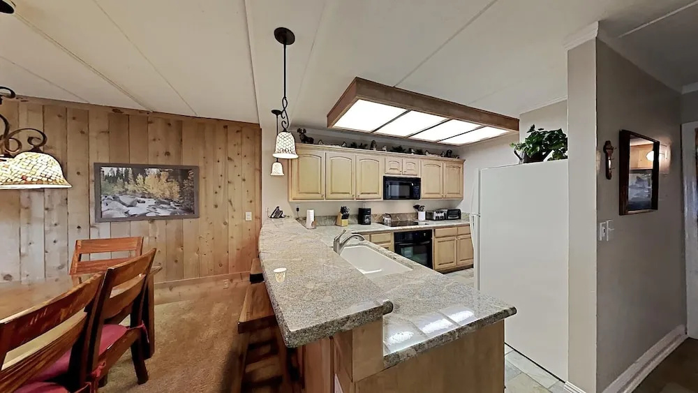 2 Bedroom Condo Just Steps Away From Summer Recreational Activities by RedAwning