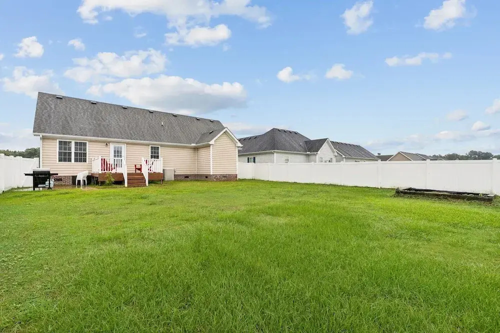 Charming Family Retreat With Spacious Yard 3 Bedroom Home