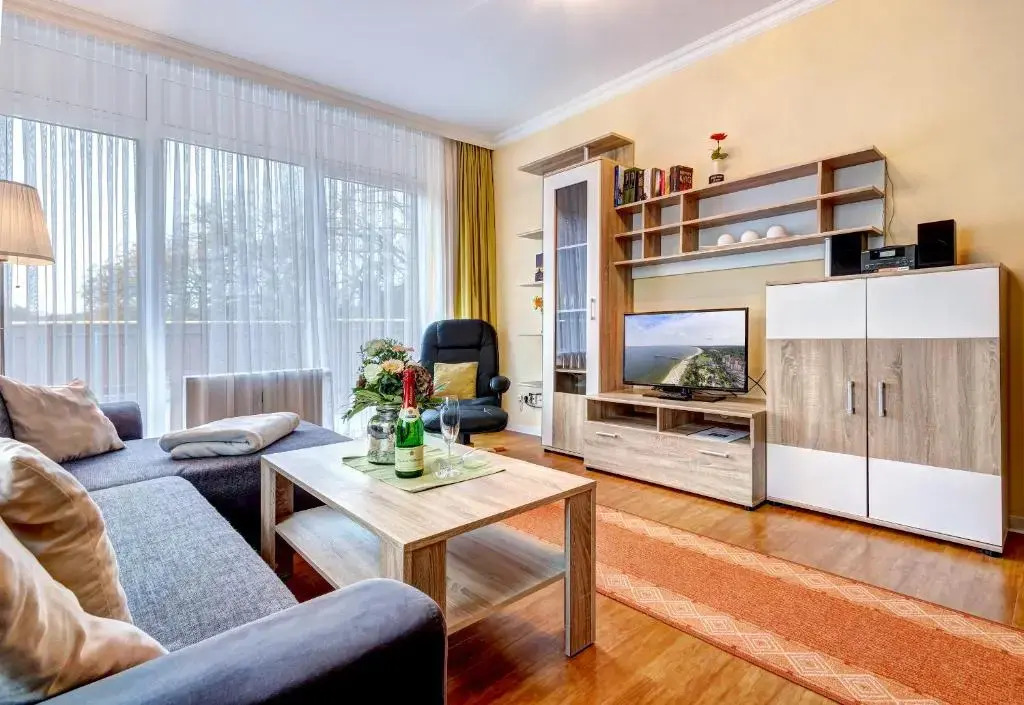 Am Schloonsee Haus D - Apartments mit Strandkorb