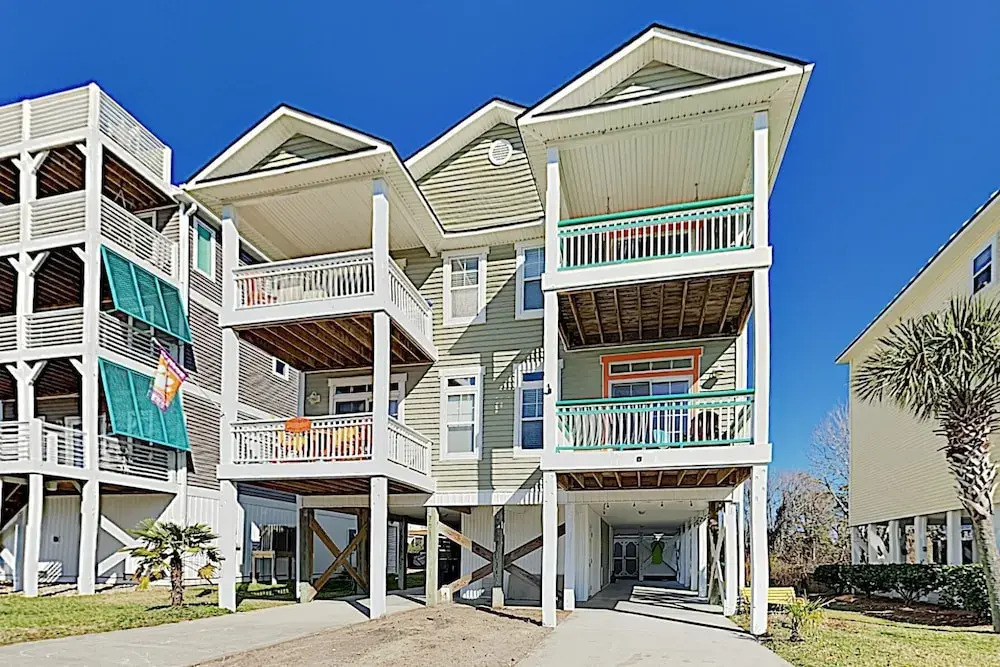 New Listing! Coastal Gem W/ Balconies, Near Beach 4 Bedroom Duplex