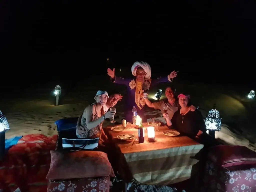 Enjoy Moda Camp Merzouga tours- Camel sunset sunrise Quad Sunboarding ATV
