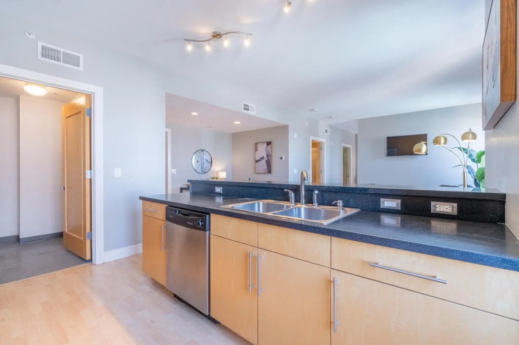King Bed | Garage | Wifi | Skywalk Access & More!