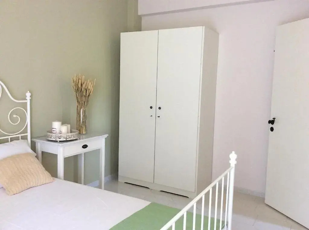 Kefalonia apartments - 2 bedroom apartment in orchard, cute veranda, ground floor