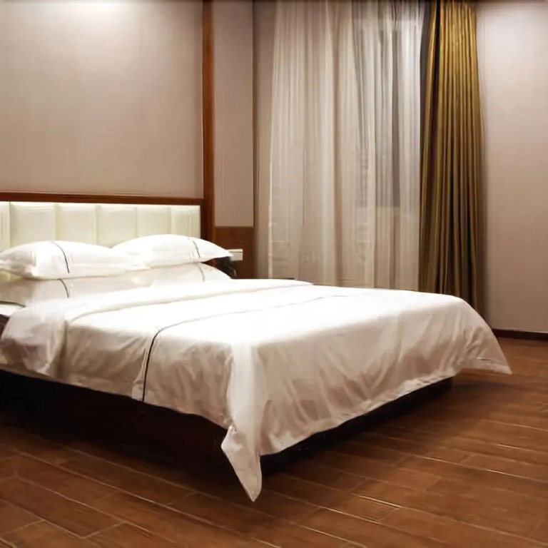 Wenhao Business Hotel (Guangzhou Julong Subway Station)