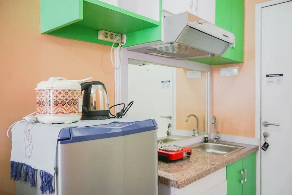 Cozy Studio Apartment at Tamansari Skylounge near Soetta Airport
