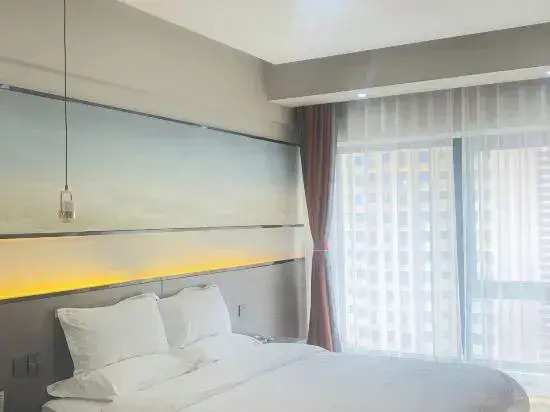 Gemini Hotel (Xinxiang Baolong Plaza)
