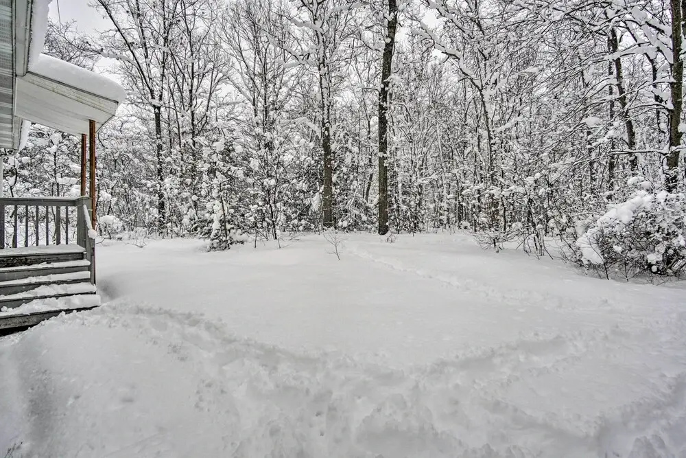 Wooded Twin Lakes Retreat: 13 Mi to Lake Michigan!