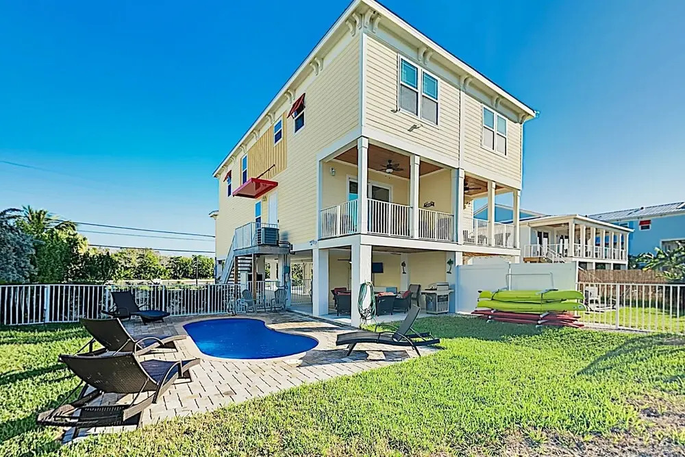 New Listing! New Canal W/ Pool & Dock 4 Bedroom Home
