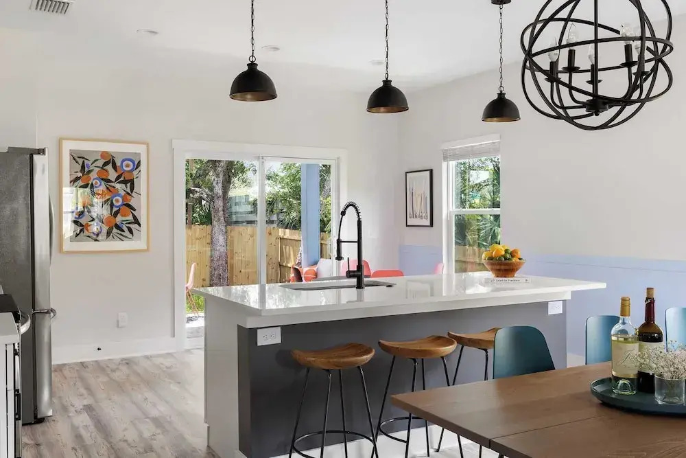 Playfully Designed Home + Hot Tub, Fire Pit & Game Room Blue Hour by Avantstay