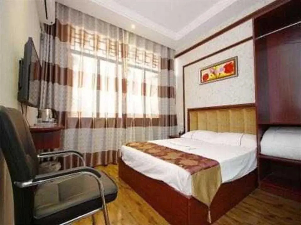 Qiqi Business Inn