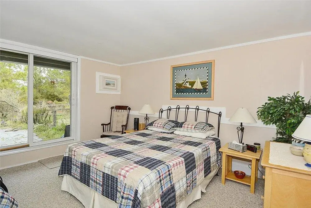 Sand Tree Atlantic Watergate 43 by Long & Foster