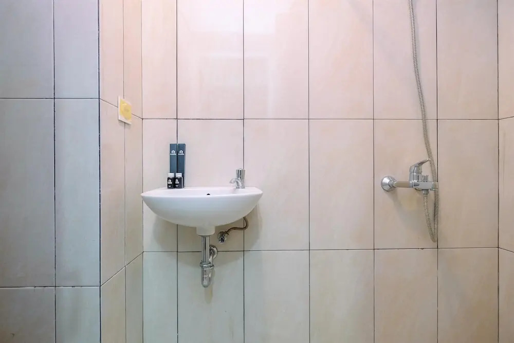 Comfort and Best Deal Studio at Grand Kamala Lagoon Apartment By Travelio