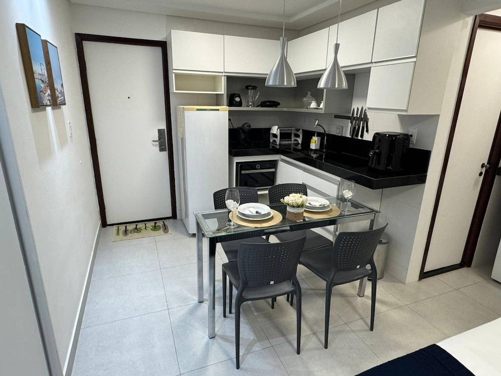 Flat com piscina a 50m da praia