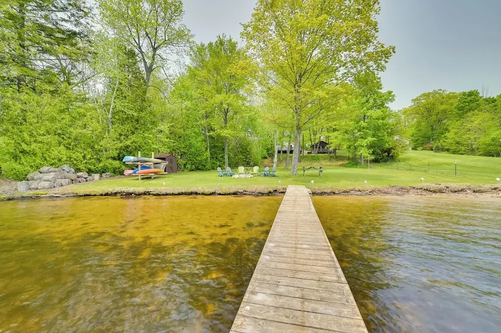 Cozy Carp Lake Cottage w/ Dock, Kayaks & Fire Pit