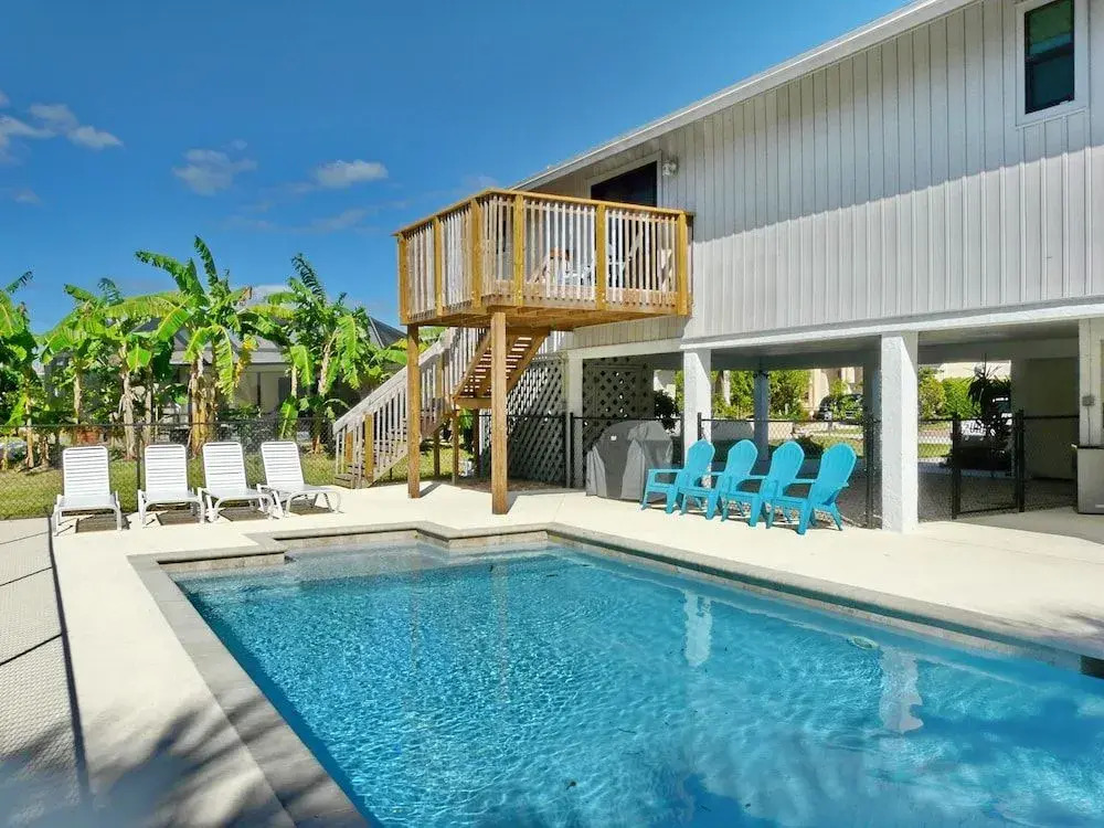 West-facing home with pool and 2nd floor porch