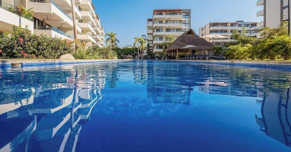 2BR Condo With Private Terrace - Near to the Beach