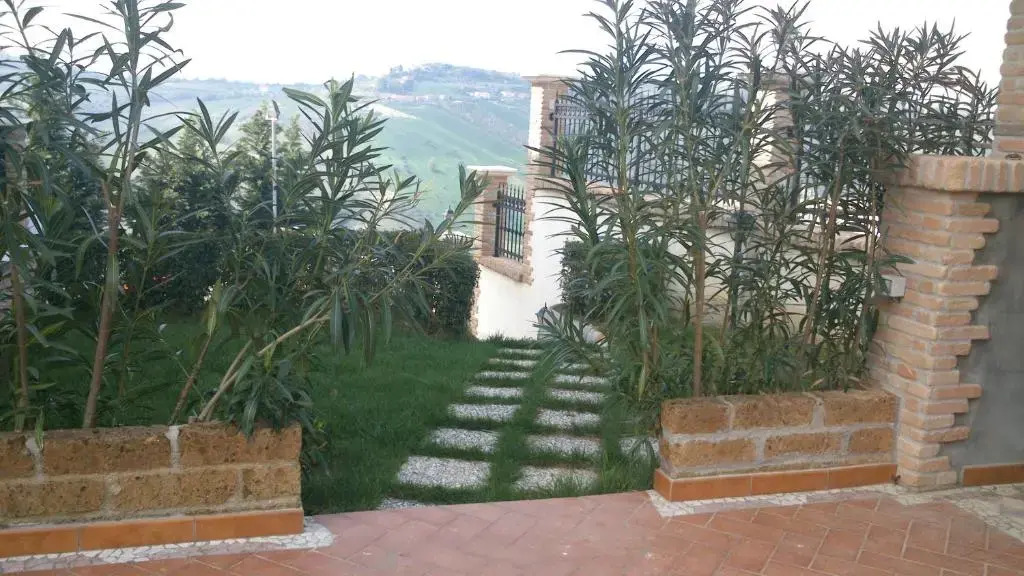 Appartamento in villa stile rustico