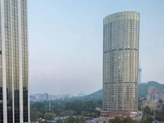 Orange Hotel (Dalian Qingniwaqiao Subway Station)