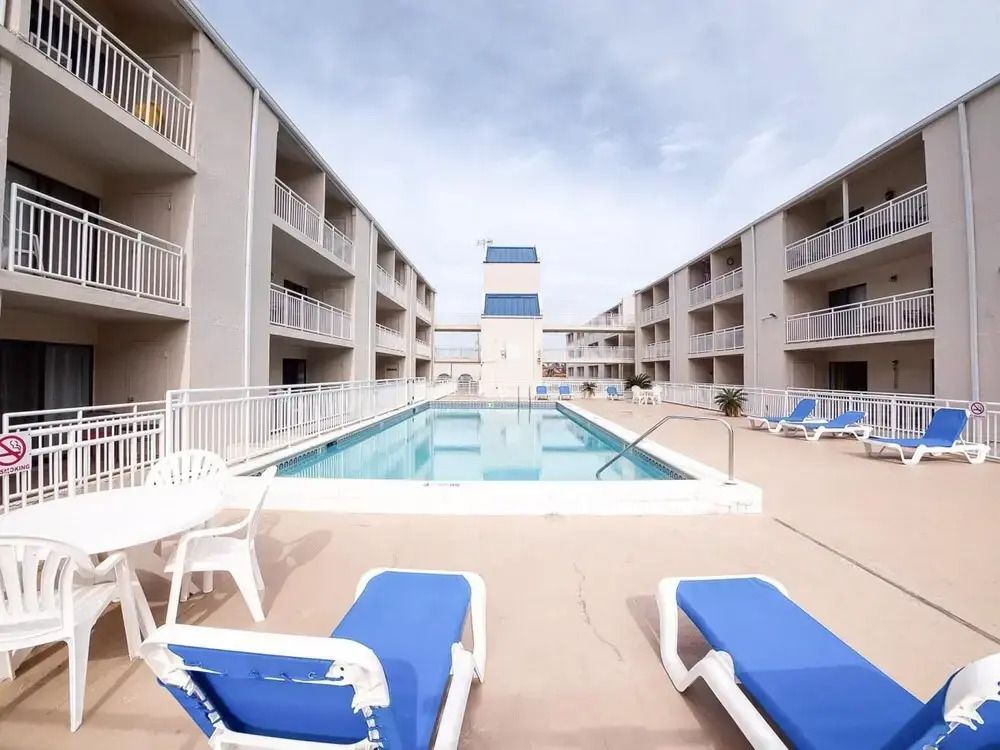 Sunset views overlooking the sugar sands in Orange Beach with multiple pools