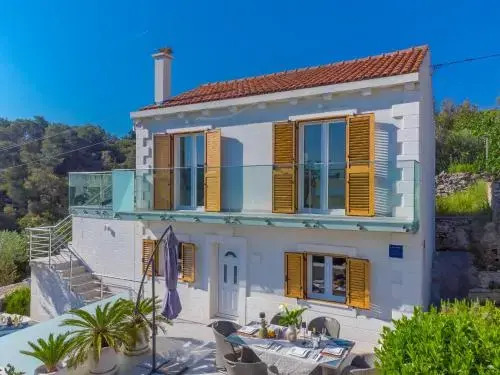 Uniquely designed Villa Ivana with outdoor Jacuzzi nearby the pebble Banje beach at the Island of Solta