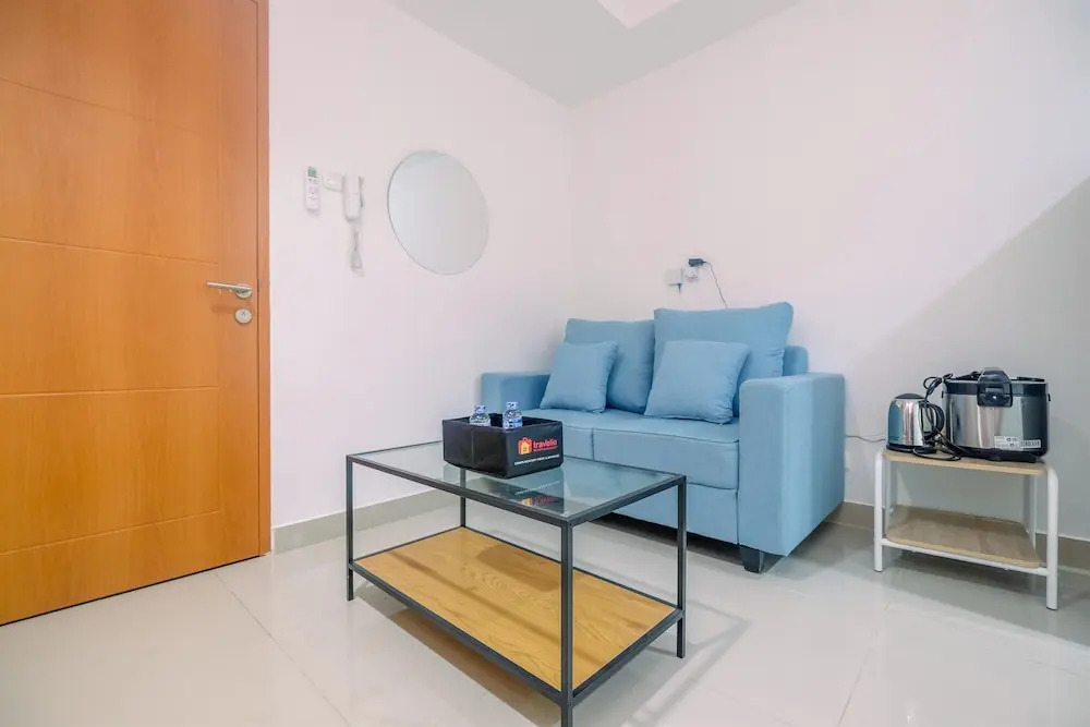 Comfort 1BR Apartment at Evenciio Margonda By Travelio