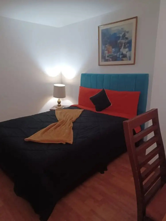 Room in Guest Room - Charming and Cozy Stay in Bogotá's Heart Perfect for Travelling Families!