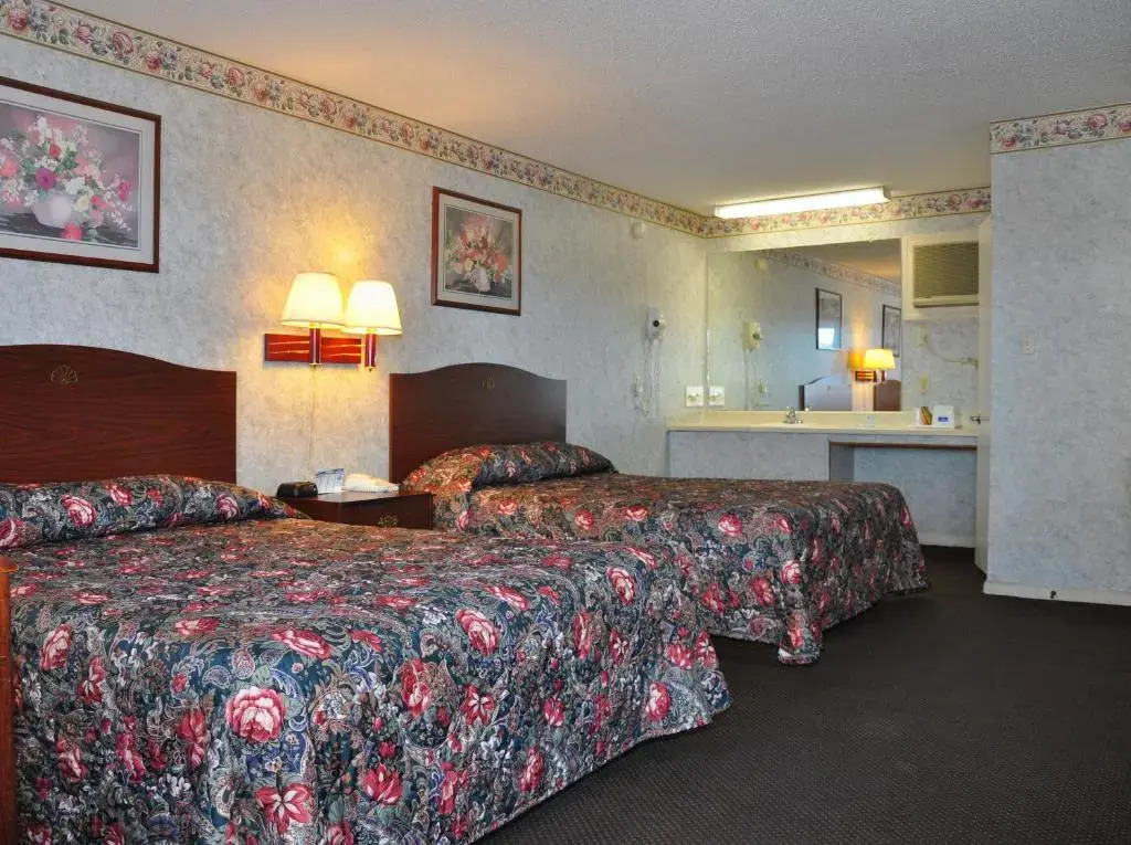 MERRIMAC INN & SUITES
