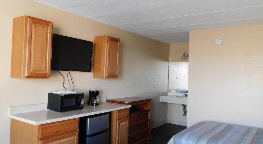 APM Inn and Suites