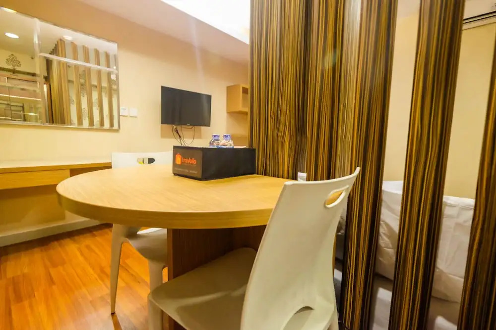 Comfy Studio Apartment at Tamansari The Hive By Travelio
