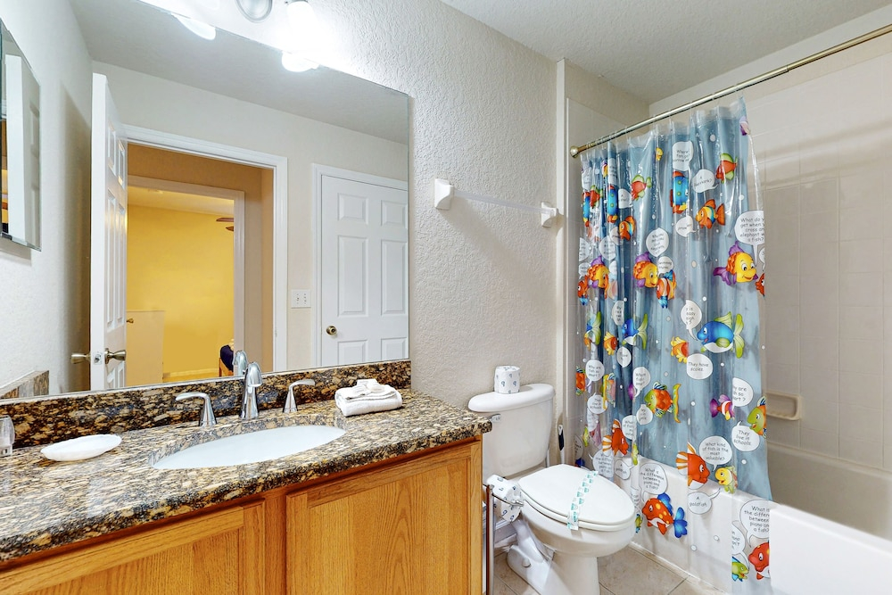 Updated Retreat With Pool Access, W/d, AC, & Patio - Close to Disney Parks