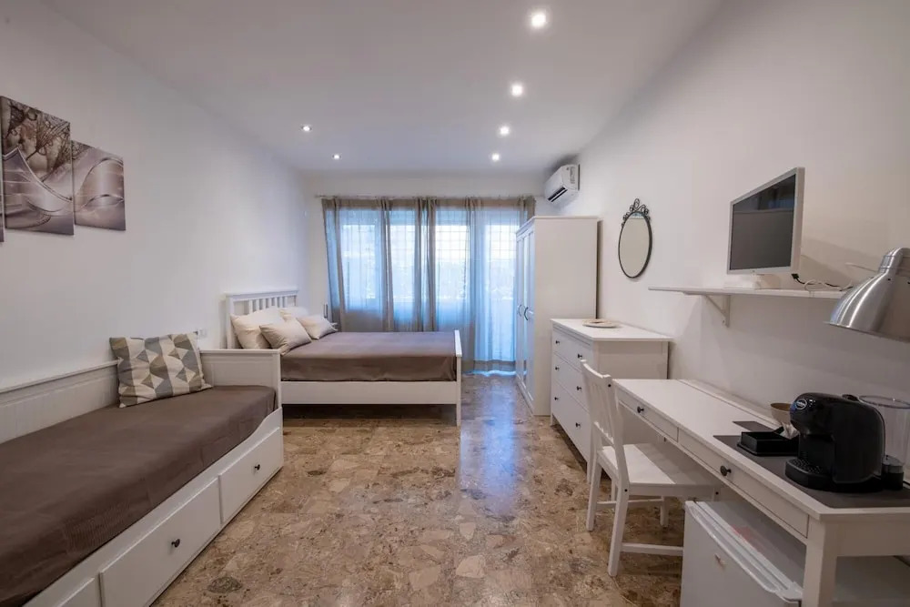 Casa Rosa Beige e Blu