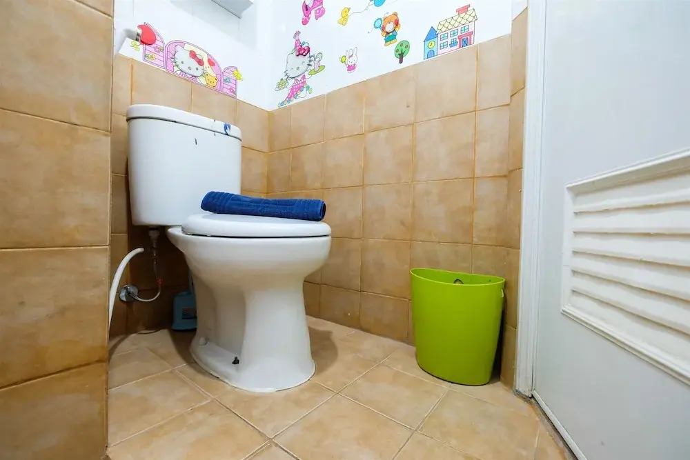 2BR Artistic Room Green Pramuka Apartment closed to Mall By Travelio