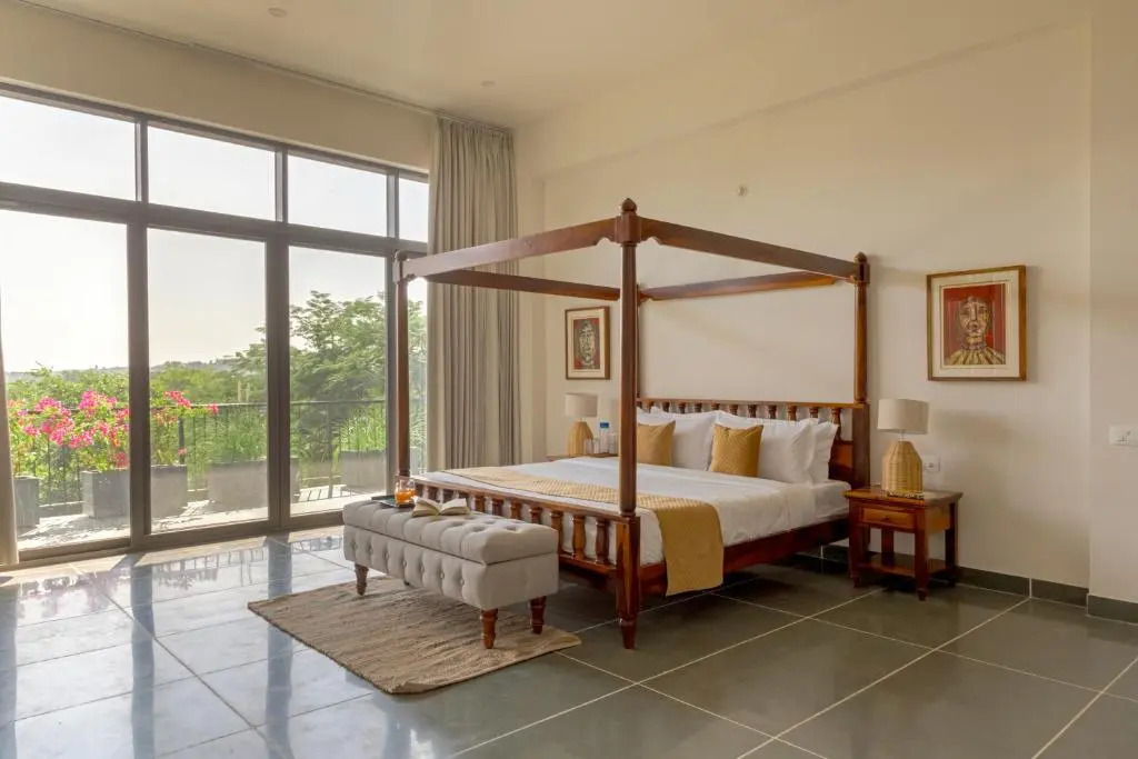 SaffronStays Camelot by the Lake - 3BR villa with glass walls, TT, projector, and gardens, Udaipur