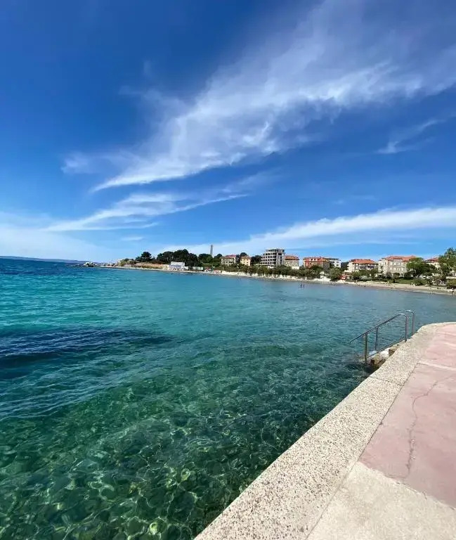 Evala luxury rooms with pool and garden