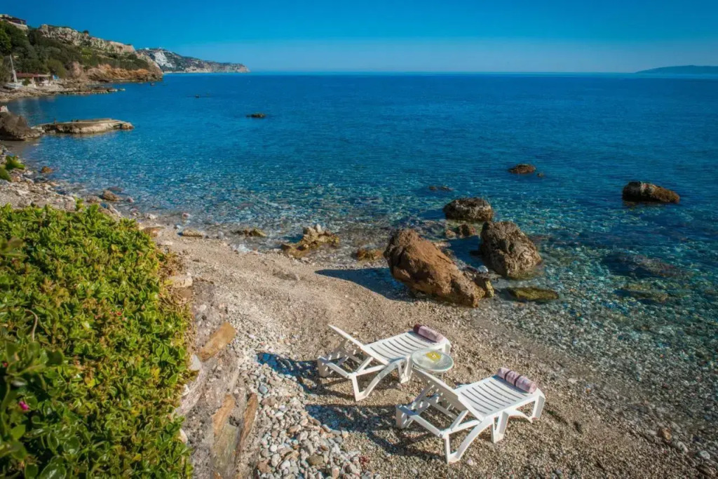 Exclusive Seaside Retreat with Shared Pool & Private Beach Access
