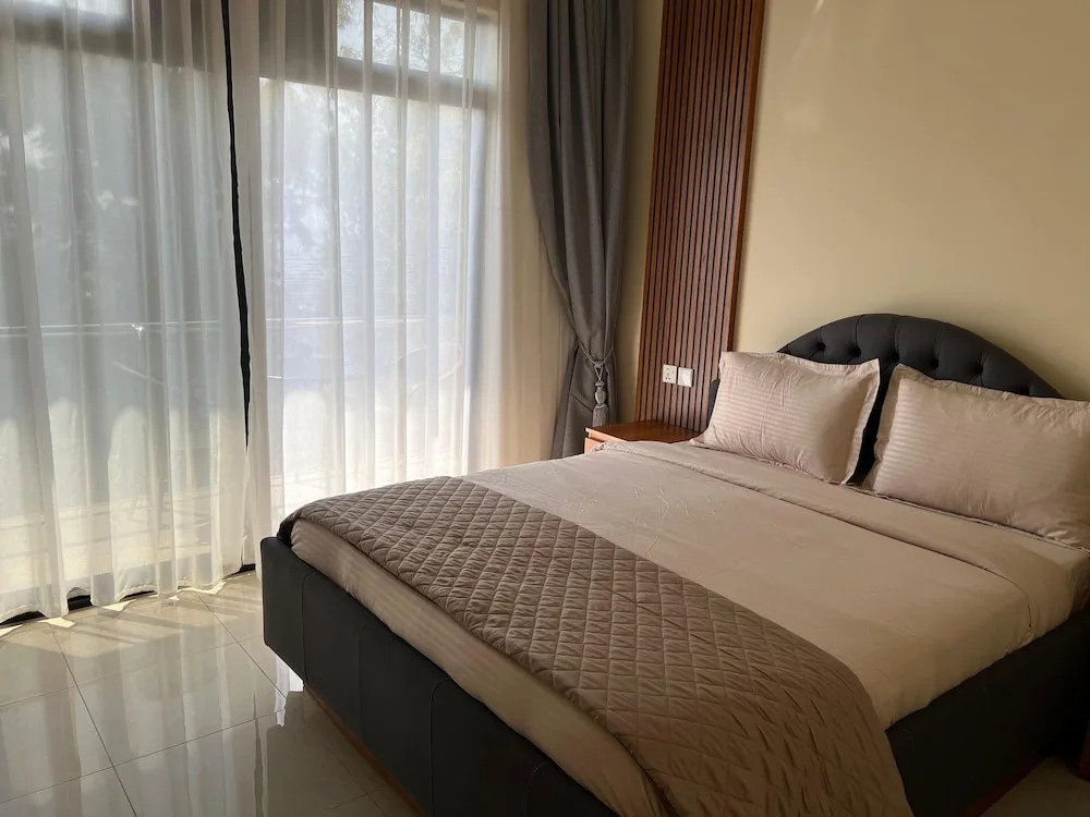 Q-Plus Apartments