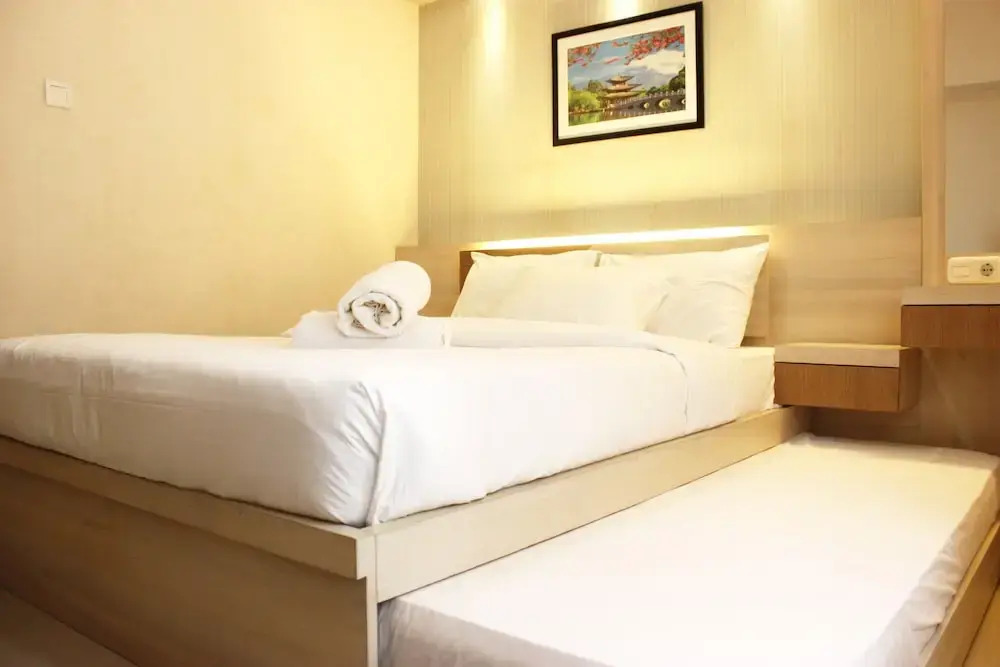Homey 2BR Apartment at Galeri Ciumbuleuit 2 By Travelio