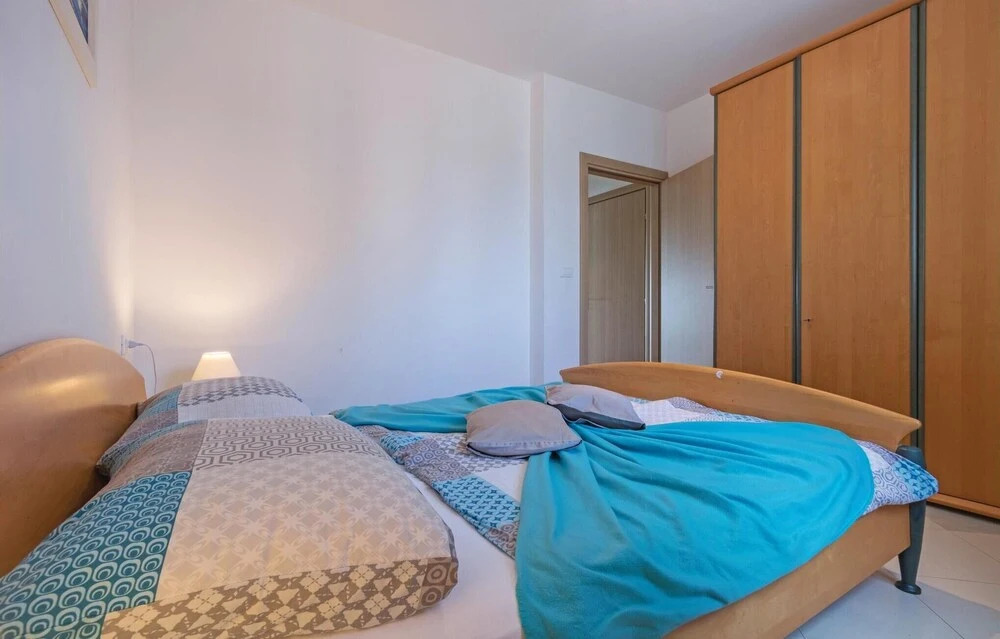Beautiful Home in Peroj With 6 Bedrooms, Outdoor Swimming Pool and Wifi