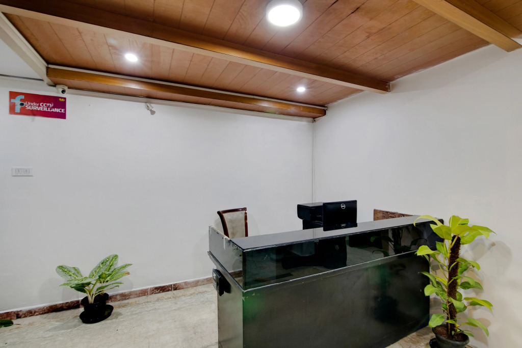 Capital O Elegant Amethyst Business Hotel Near Ragigudda Sri Prasanna Anjaneyaswamy Temple