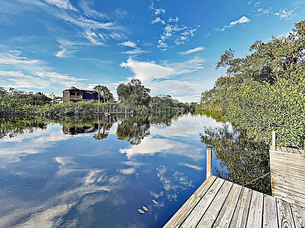 New Listing! Riverfront W/ Hot Tub & Dock 3 Bedroom Home