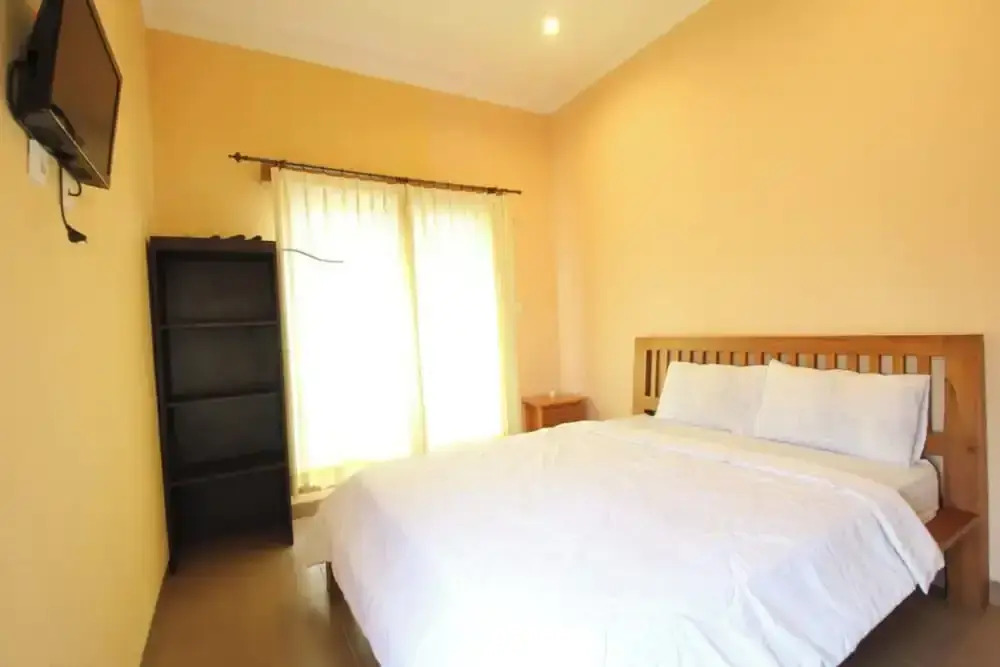 Capital O 94011 Binhari Guest House