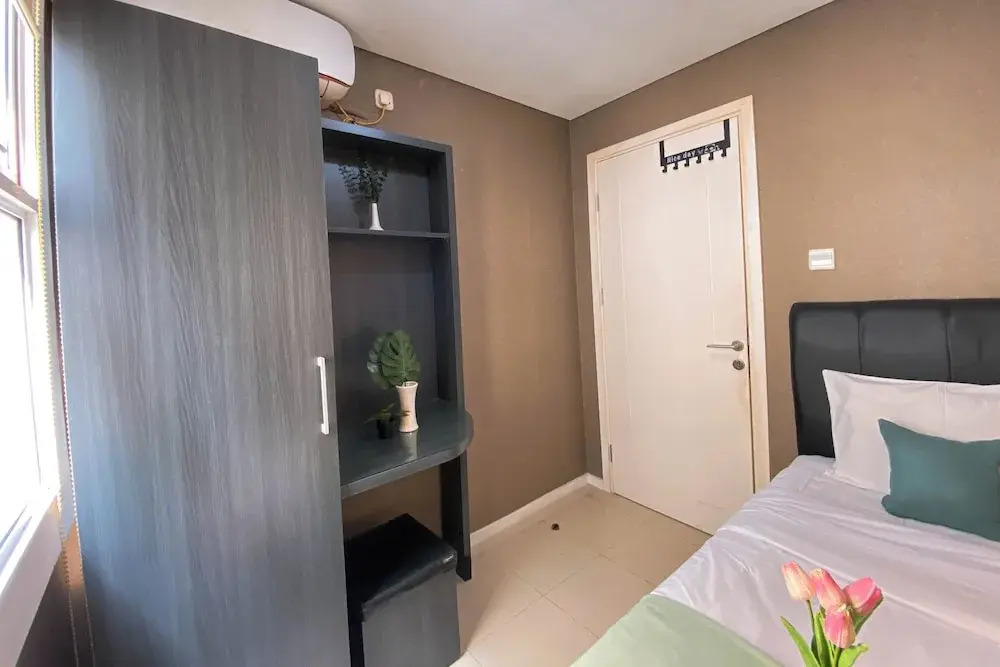 Deluxe 2BR at Parahyangan Residence By Travelio