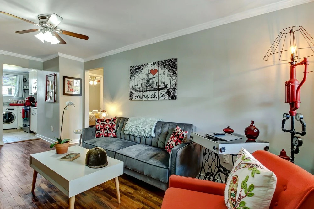 Vibrant, Colorful Condo Building With Backyard Firepit and Games
