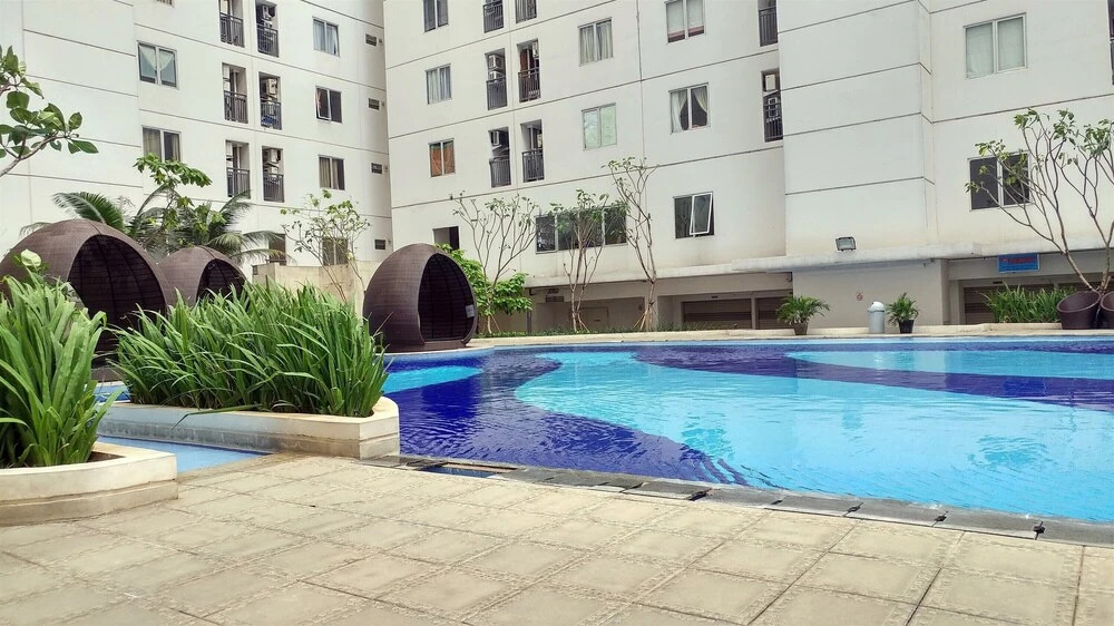 Beautifully Designed 2BR Bassura City Apartment By Travelio