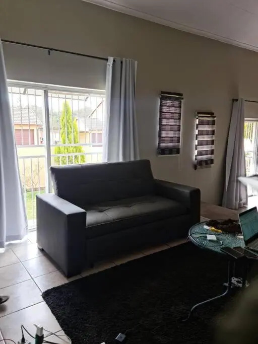 Justin's Place Lounge. An Exceptional Home with no Load Shedding, by The Grove Mall and Wilgers Hospital.