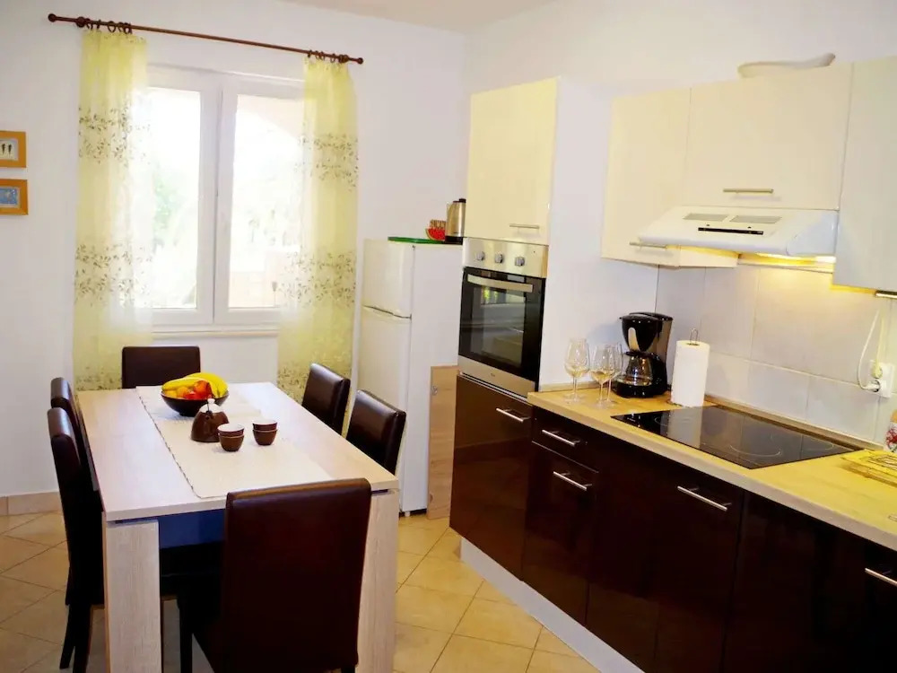 Comfortable apartment with covered  terrace and fenced garden