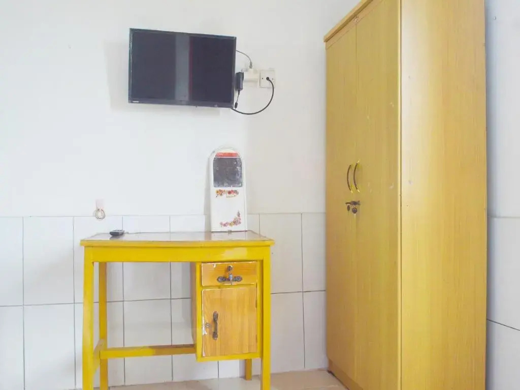 SPOT ON 91623 Pj Guest House Syariah