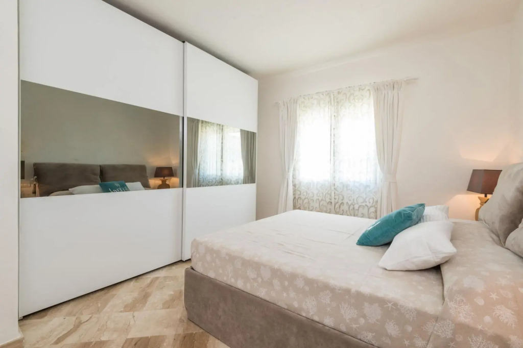 It features a large living area with fully equipped open kitchen and access to the covered terrace d-S'ABBA 1